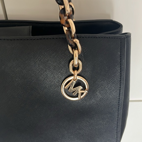 Authentic Michael Kors black everyday wear purse with tortoise and gold chain. - Picture 3 of 3